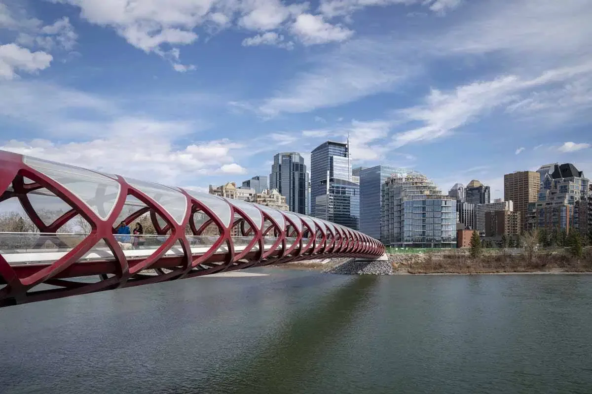 Calgary downtown skyline with the Bow River and Rocky Mountains in view