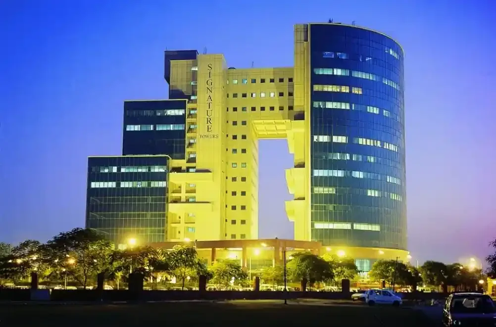 Software engineers collaborating at a Gurugram office, representing flexible staff augmentation for local tech teams